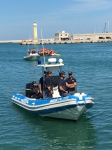 Polizia_di_Stato_Squadra_Nautica_PS1175_con_personale_UOPI_imbarcato.JPG