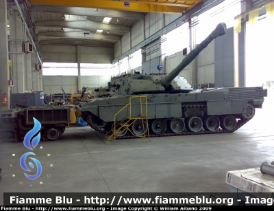 Iveco Oto-Melara MBT Ariete C1
Esercito Italiano
Carro da Battaglia durante la manutenzione presso il Polo Mantenimento Mezzi Pesanti di Piacenza
Notare il suo motore diesel turbocompresso Iveco V12 da 1.247hp posizionato affianco
Parole chiave: Iveco Oto-Melara MBT_Ariete_C1