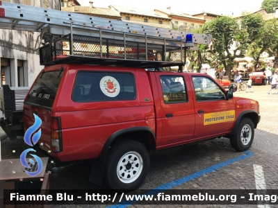 Nissan Pick-Up
Vigili del Fuoco
Comando Provinciale di Belluno
Distaccamento Volontario di Selva di Cadore (BL)
Utilizzato come carro luce 
Veicolo con targa civile AC 963 DH
Parole chiave: Nissan Pick_Up AC963DH Ventennale_VVF_Asolo